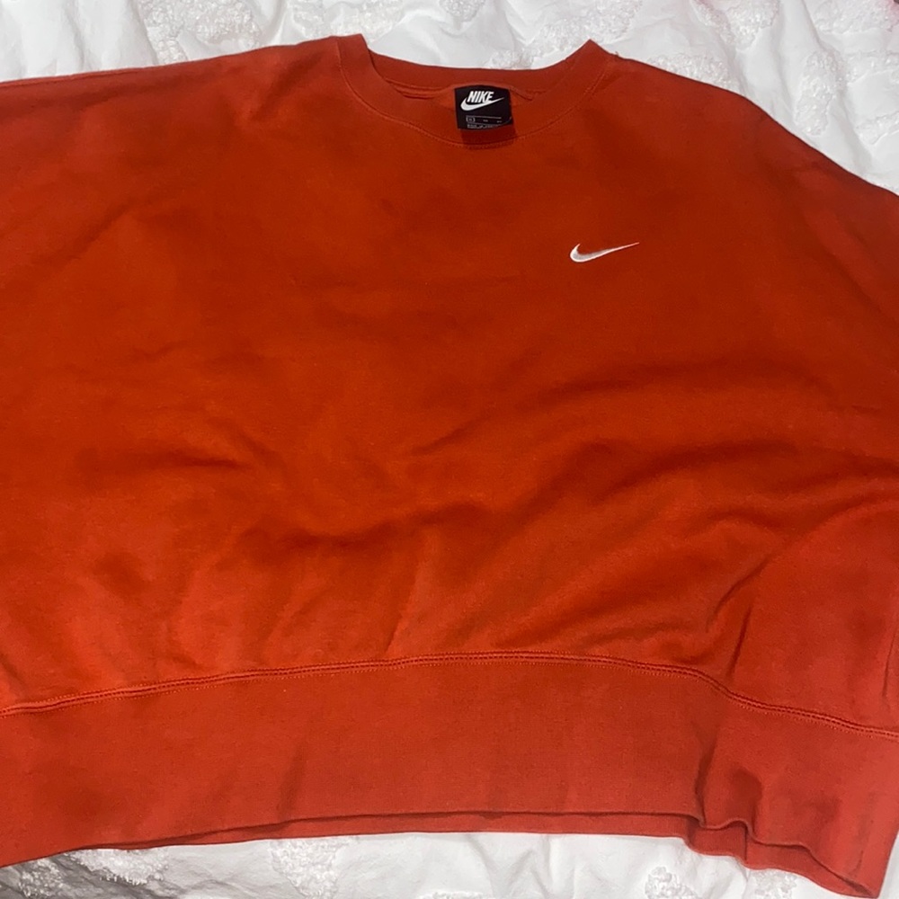 Orange Nike sweatshirt
